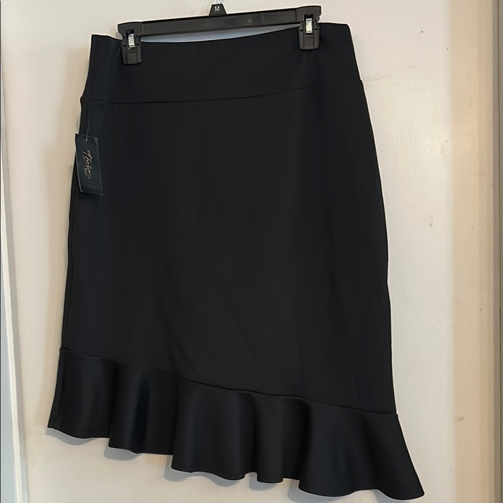 NWT Thalia Sodi Elegant Black Ruffle Hem Skirt higher on one side. So cute.